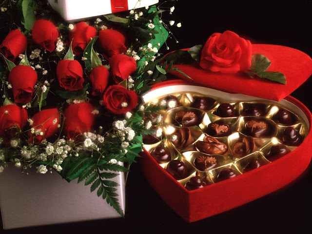 Presenting flowers and chocolate as a gift