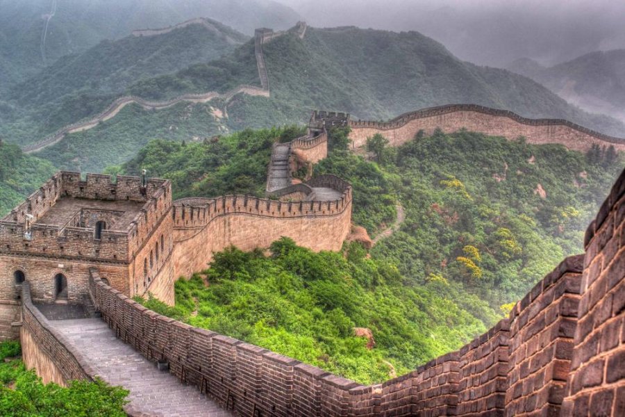 The Wall of China The story started when Van Shi Liang was trying to escape from the Emperor's soldiers who were gathering young people to do forced labor in building the Great Wall of China.