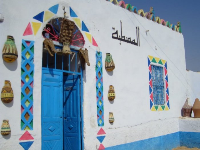 Go for a walk in the colorful old streets of the Nubian villages of Aswan