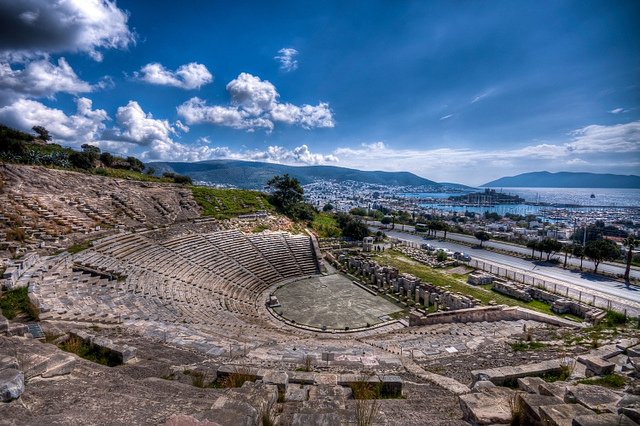 The historical amphitheater overlooks the sea in a magical sight