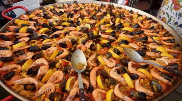 During the preparation of the paella at the La Tomatina festival in Spain