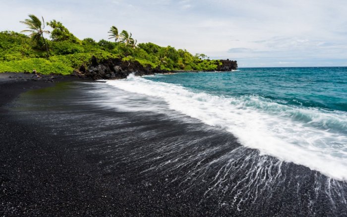 The most famous black beach in the world is Punalu Beach in Hawaii, also known as the Black Beach
