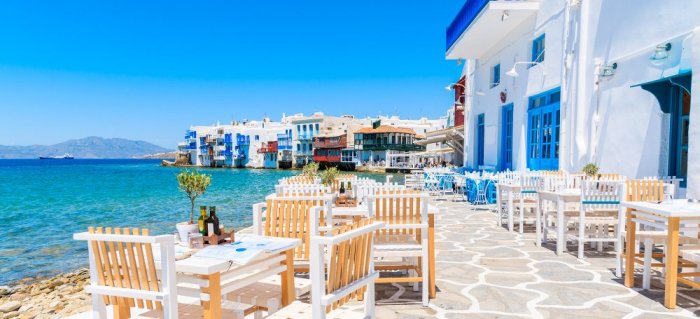     Mykonos Island is famous for its beautiful white buildings and its bright sun