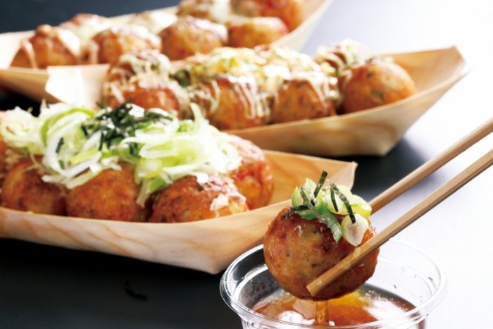 Takoyaki are round cakes cooked and stuffed with cuttlefish