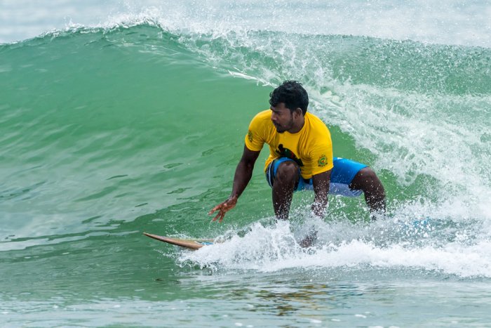 Surfing is a favorite sport in Kovalam
