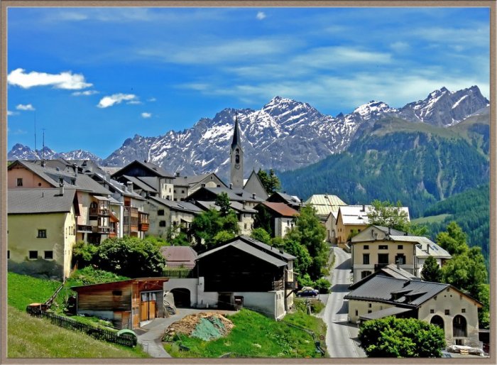 Guarda is a remote, small village famous for being the home of a beautiful group of homes