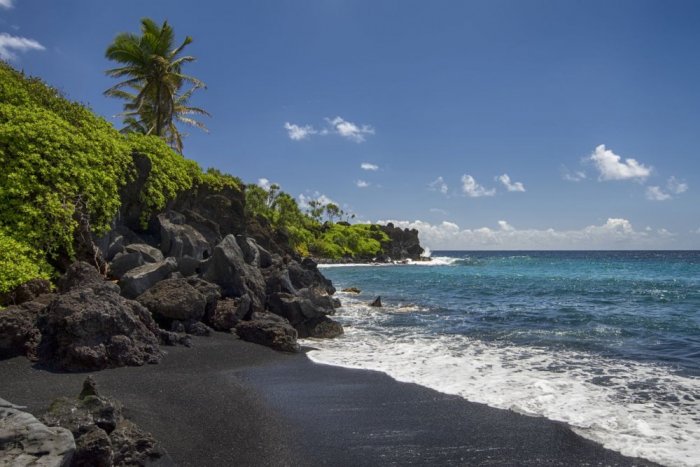 A strange black sandy beach in Hawaii