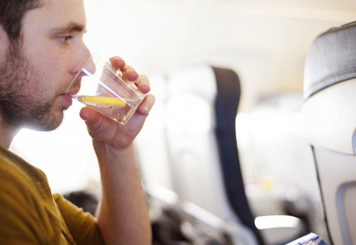     Do not drink water on the plane without making sure it is mineral water
