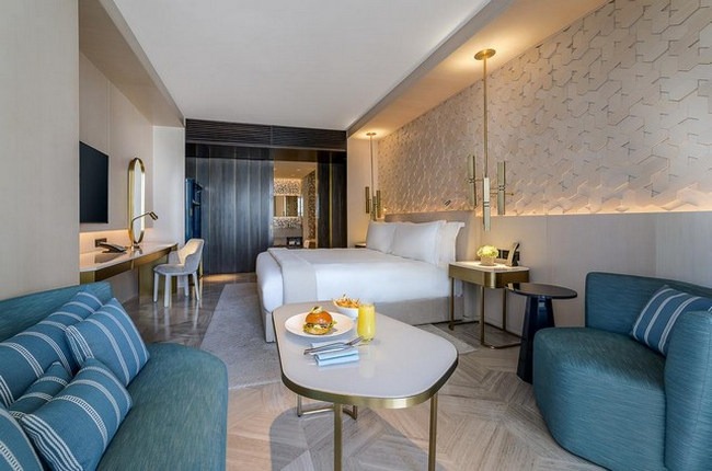 The Palm Jumeirah Dubai offers luxury suites and a comfortable seating and work area