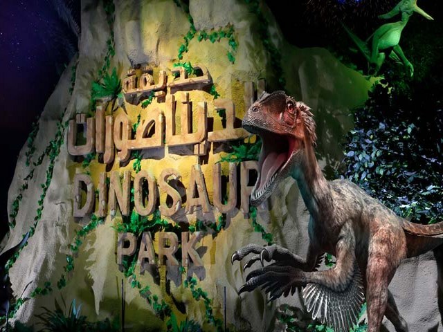 Dinosaur Park in the illuminated park in Dubai