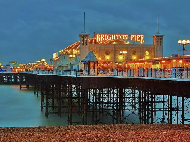 Where is Brighton located and the distance between it and the most important city in England