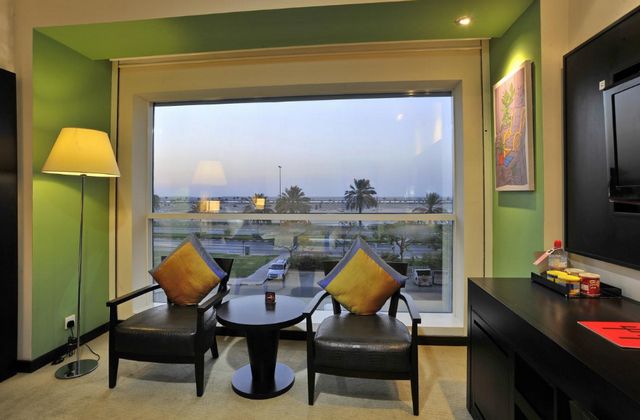 Room facilities at Dubai Hues Boutique Hotel provide a comfortable seating area