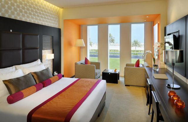 The Hughes Boutique Hotel rooms feature bright colors and exquisite décor