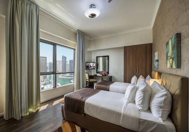 City Premiere Marina Hotel Apartments in Dubai includes an outdoor pool, a fitness center, and a wellness center