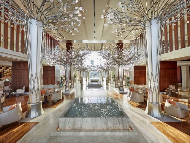 The Lobby Lounge at Mandarin Dubai features upscale decor and bright lighting 