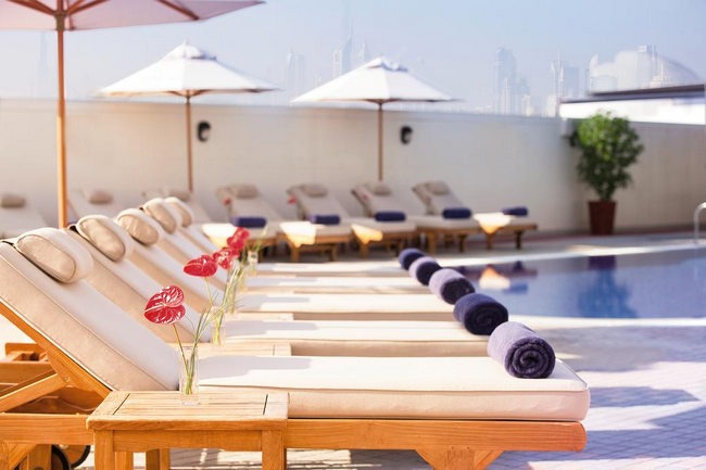 The Grand Plaza Movenpick Hotel Dubai includes an outdoor pool