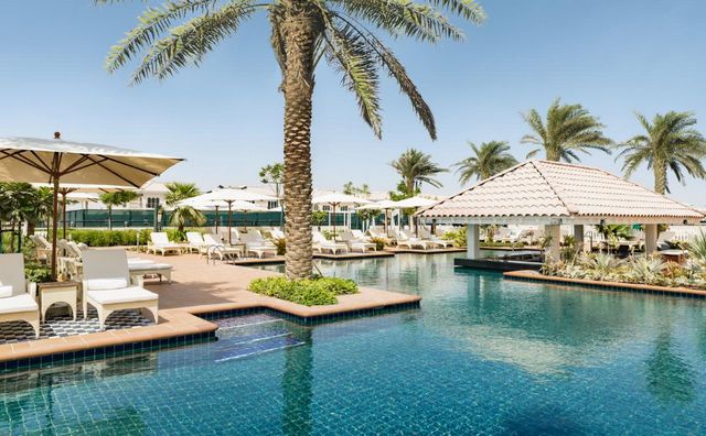 The Al Habtoor Polo Hotel Dubai boasts a large outdoor pool, ideal for relaxation.
