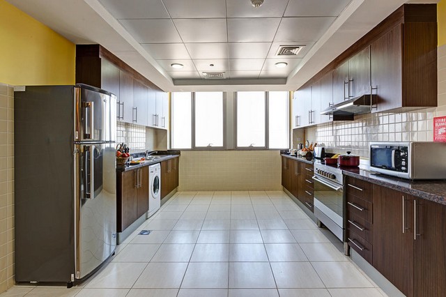 The apartments of Abidos Hotel Dubailand have fully equipped kitchens.