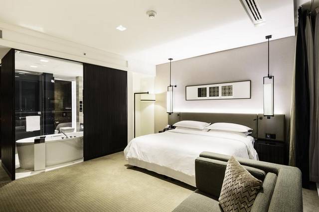 Sheraton Grand Dubai, Sheikh Zayed Road rooms feature modern décor.