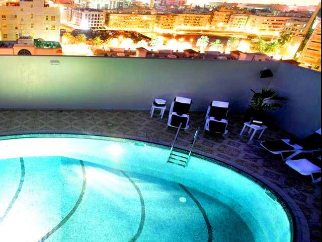 The apartments have a charming outdoor pool