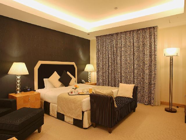 Decorating one of the rooms of the Copthorne Hotel Kuwait, which is classified as one of the best resort in Kuwait for families
