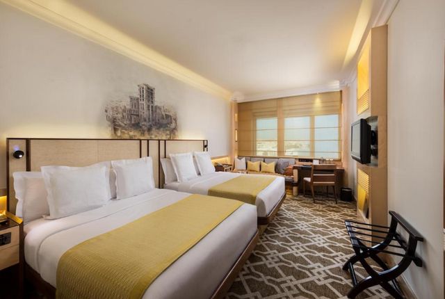 Rooms at Marco Polo Hotel Dubai feature elegant décor