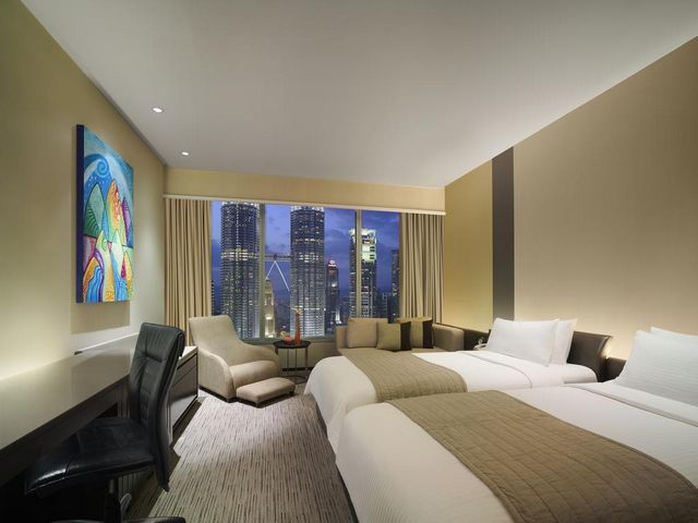 Most rooms of Traders Hotel Malaysia overlook the Twin Towers in Kuala Lumpur