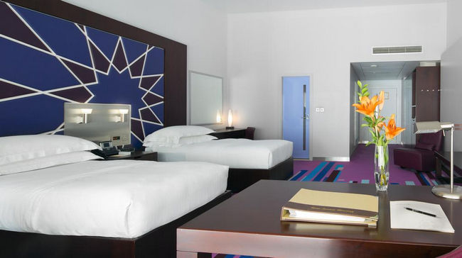 Spacious rooms with simple décor at Dubai International Airport Hotel