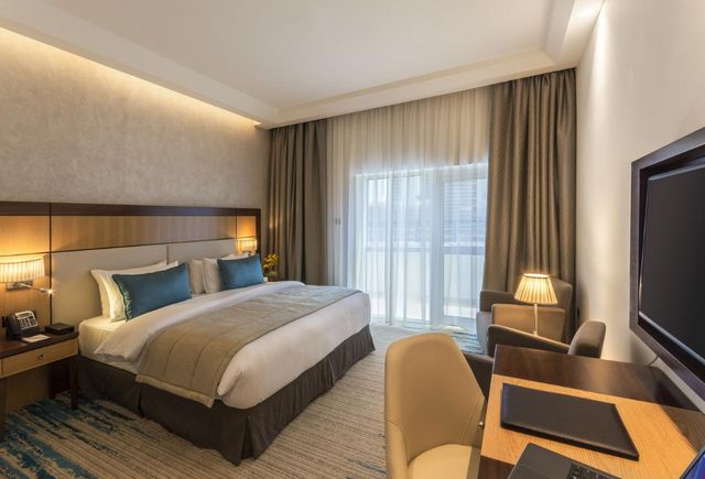 Golden Tulip Media Hotel Dubai offers modern rooms and suites