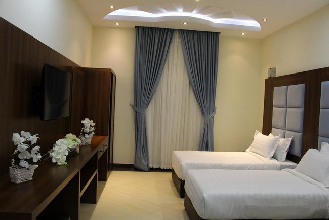 Stylish rooms with a flat screen in Al Khobar Hotel Apartments 