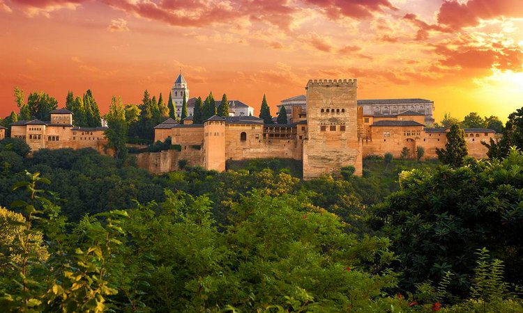 Where is the Alhambra Palace located in Spain