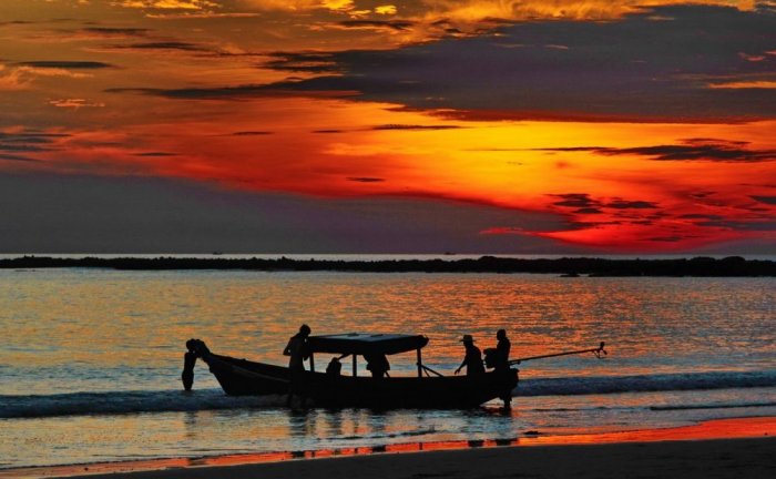 Go on a boat trip in Myanmar