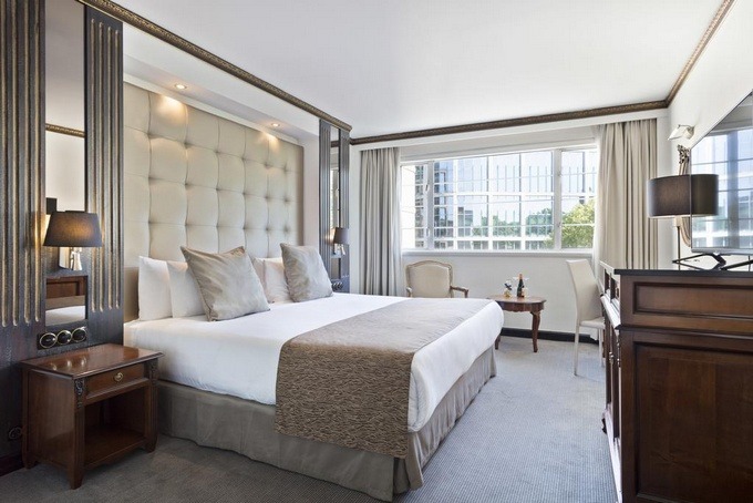 Quiet designs for four-star London hotel rooms.