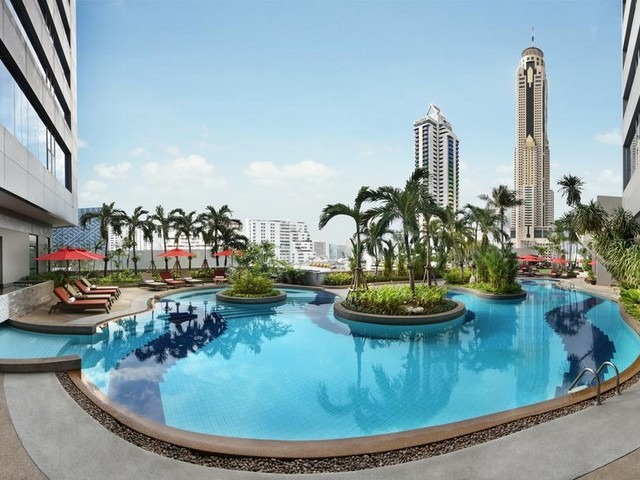 Swimming pool with facilities and distinctive vibes at Amari Watergate Hotel Bangkok