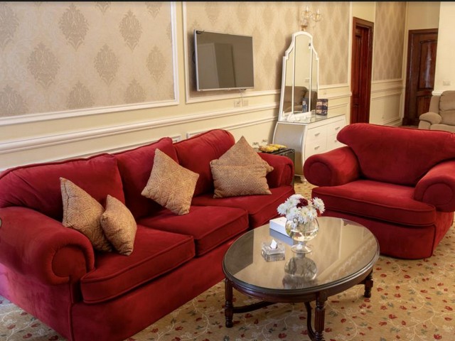 Living area in the rooms of Al Mamoura Palace Hotel